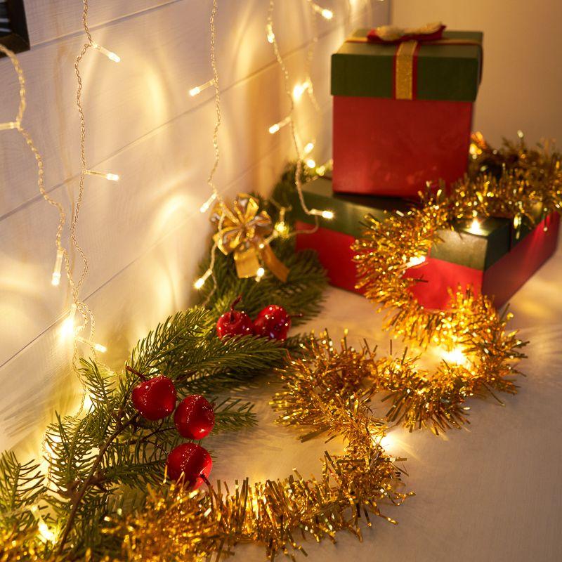 Гирлянда светодиодная Мишура 1.5м 10LED зол. тепл. бел. 0.1Вт IP20 провод ПВХ прозр. элементы питания 2хAA (не в компл.) Neon-Night 304-012