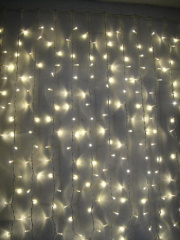 Гирлянда светодиодная Бахрома 1.8х0.5м 48LED схема нитей 1/2/3/5/3/2 тепл. бел. IP20 возможность соединения до 3шт 220В КОСМОС KOC_CUR-V21